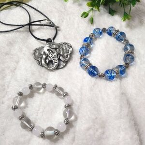 Handmade bracelets clear, blue, and silver beads with elephant pendant necklace